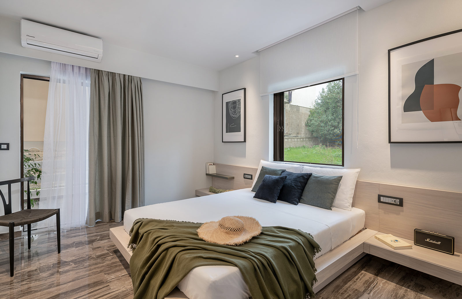 Hotel bedroom interior, bedroom with a widow above of the bed