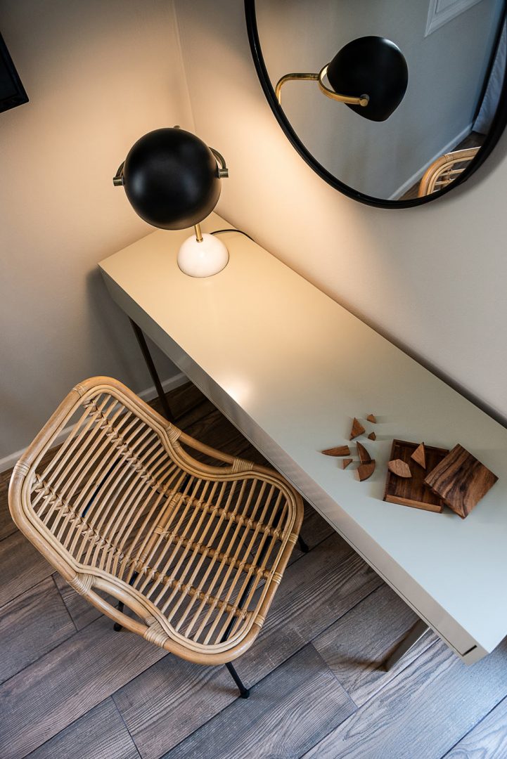 Hotel bedroom interior,chair in front of the mirror